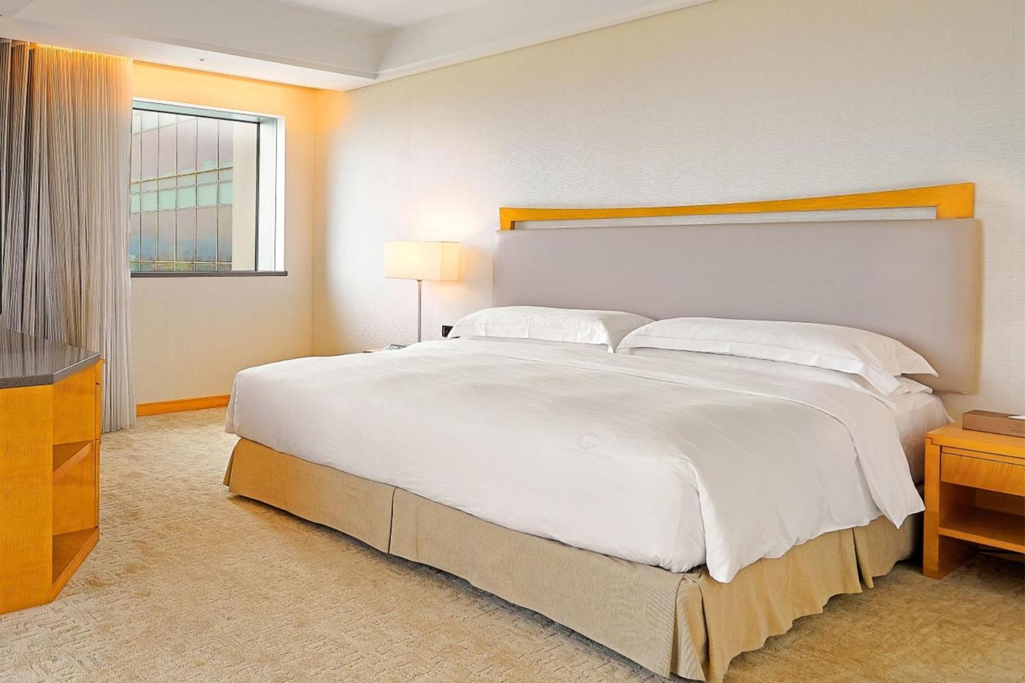 Windsor Hotel Taichung Rum bild A bedroom at the hotel